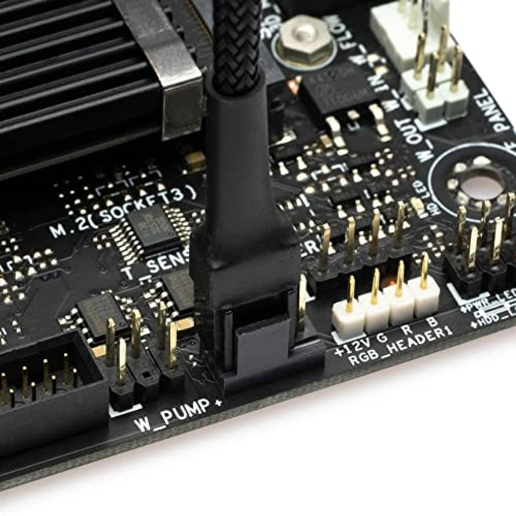 Adapter cable connector plugged into motherboard header, with black housing and pins