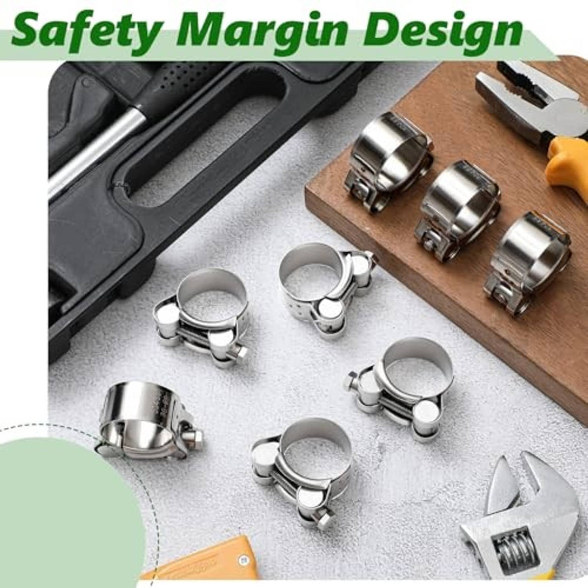 Stainless T-bolt hose clamps on work surface, adjustable bands with slotted head screws