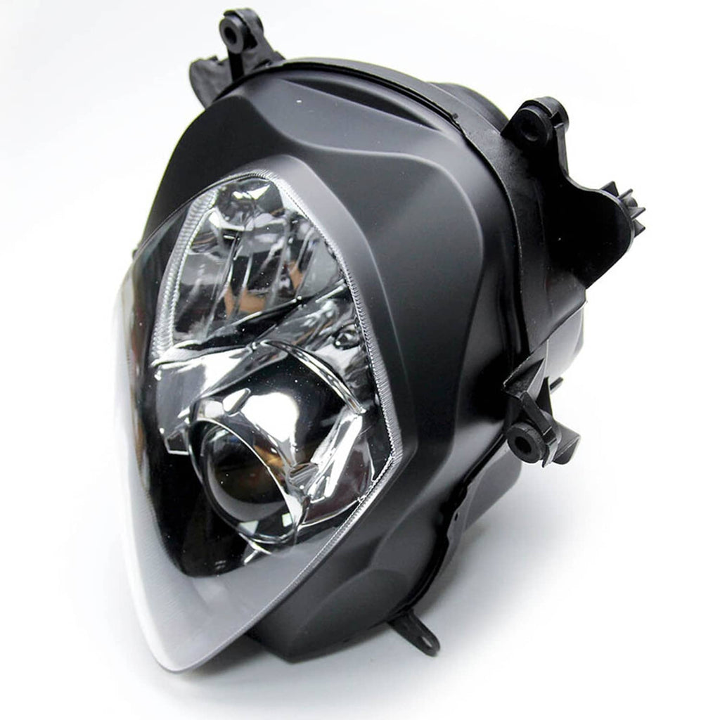 Front headlight assembly angled view with clear lens, black bezel, and side mounting tabs