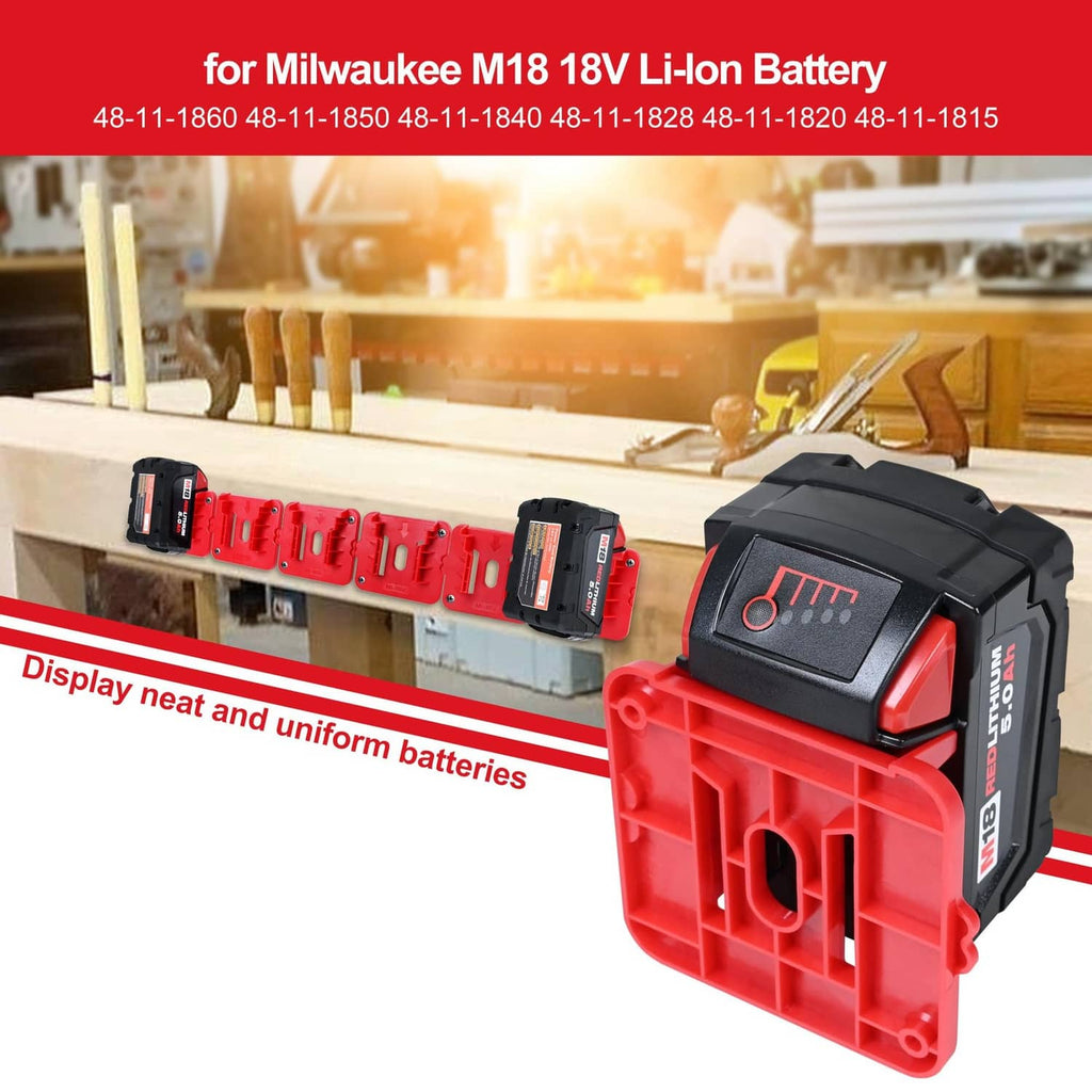 Red battery pack holder with black battery module on wall-mounted strip