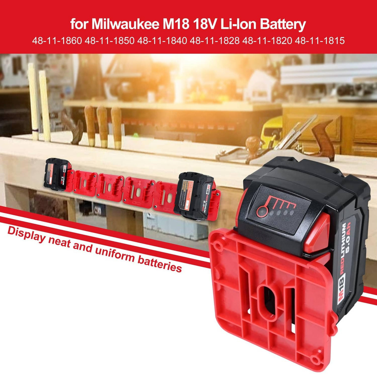 Red battery pack holder with black battery module on wall-mounted strip