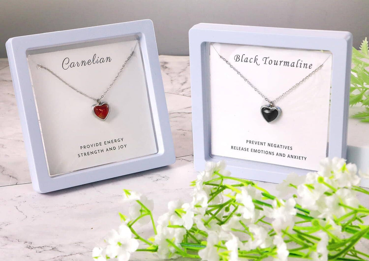 Heart pendant necklaces in gift boxes: red carnelian and black tourmaline