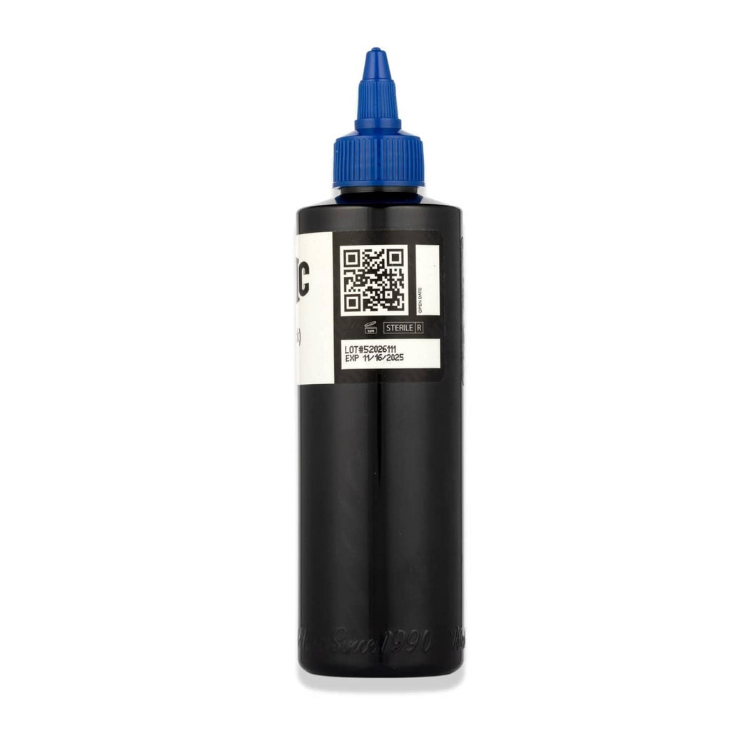 Dynamic ink bottle with blue cap; back label with QR code and barcode.
