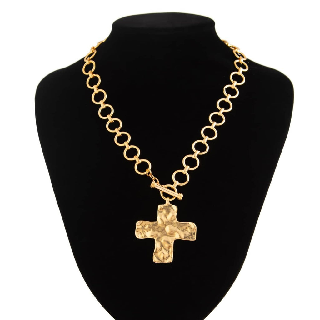 Gold-tone chunky chain necklace with textured cross pendant on bust