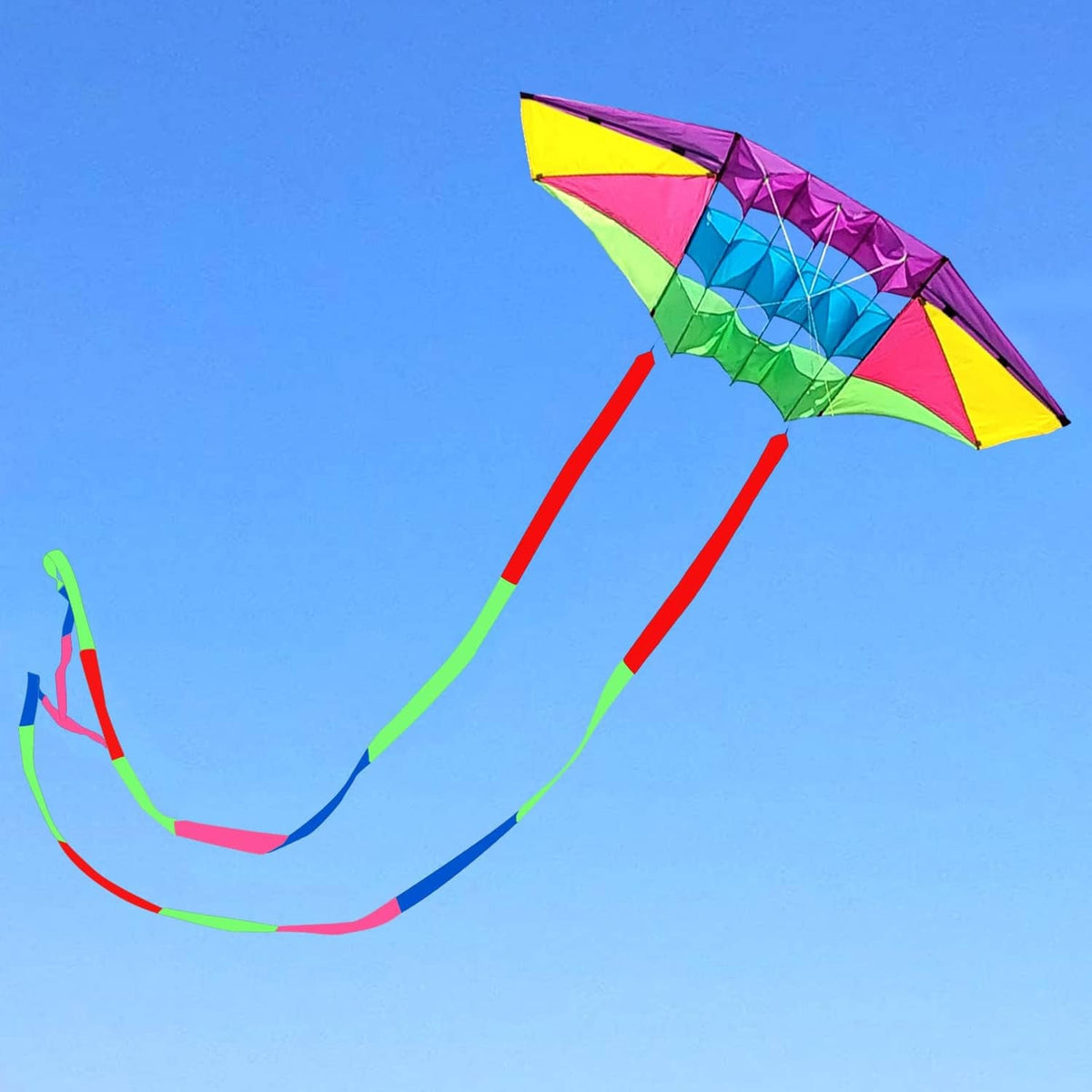 Rainbow beach kite with twin long tails, multicolor ripstop diamond sail