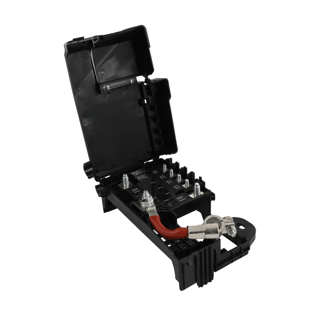 Black fuse box terminal with cover open, metal terminals and red wire connection