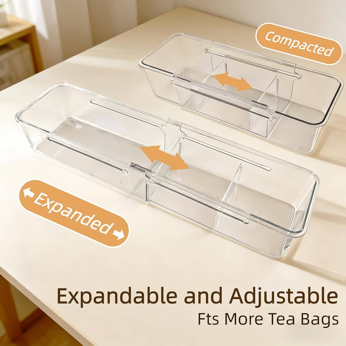 Clear acrylic tea bag organizer with adjustable divider bars, shown expanded