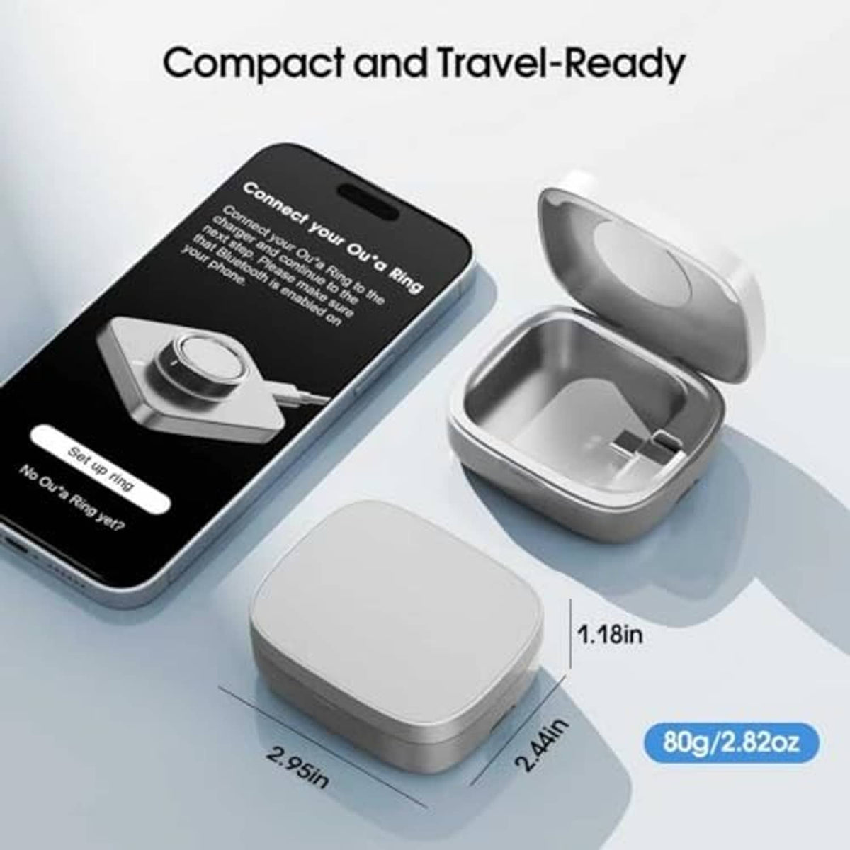 Gray portable Oura Ring charging case with USB cable and built-in cradle