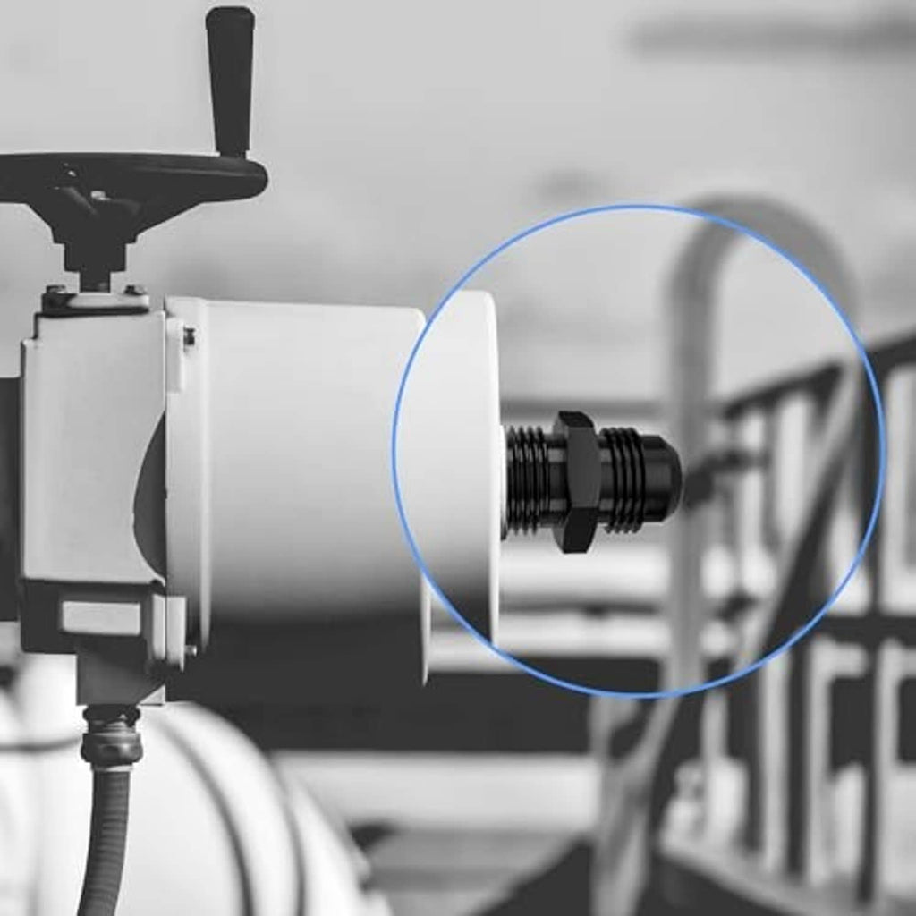 AN10 flare straight fitting installed on a metal hose connection, showing threaded join.