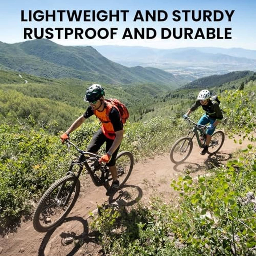 Two mountain bikes riding on a dirt trail with green hills in the background