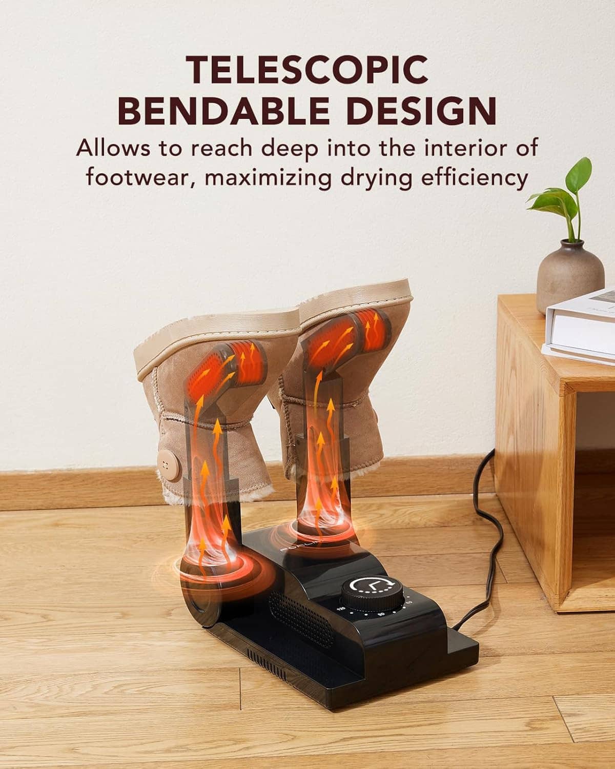 Boot dryer with telescopic bendable arms drying a pair of tan boots