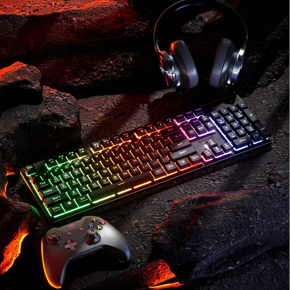 Black wired gaming keyboard with rainbow LED backlit keys in a wide layout