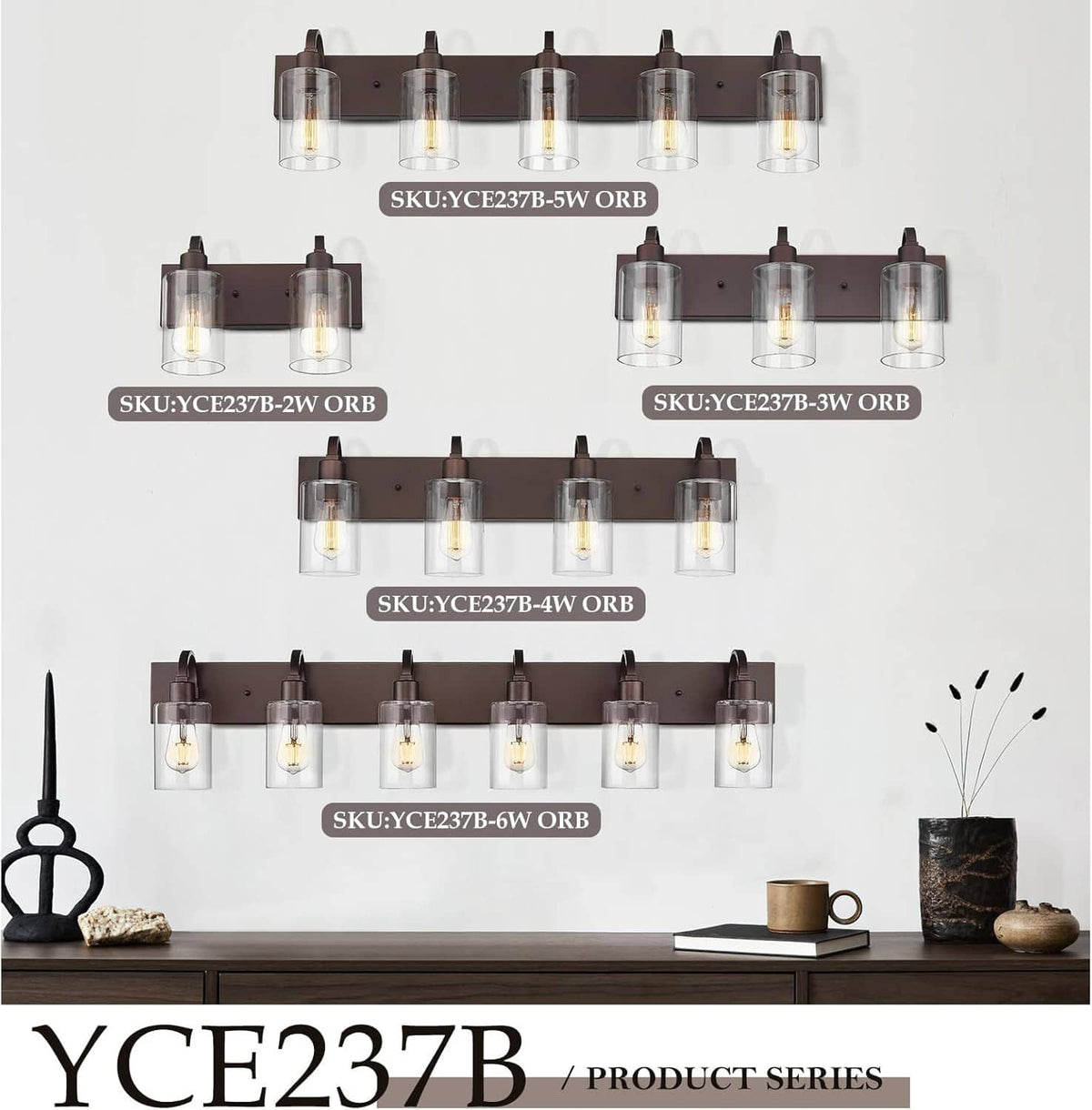 Wall-mounted vanity light with dark bronze backplate and clear glass cylinder shades