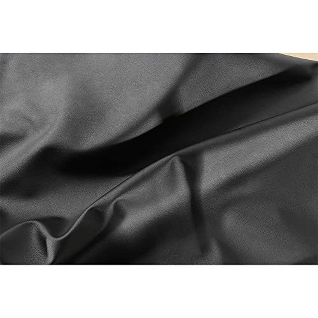 Black PU vinyl cover fabric with visible wrinkles and subtle sheen