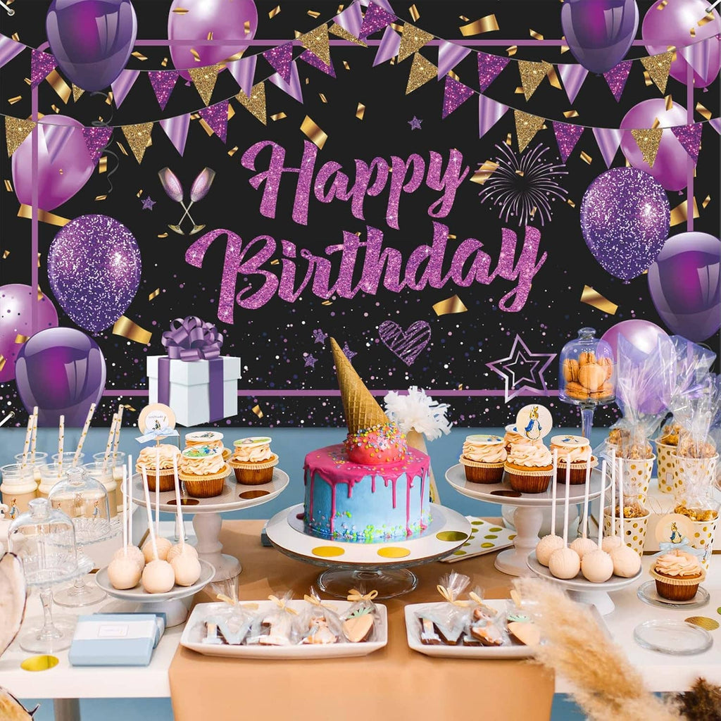 Happy Birthday banner above party table with cupcakes, candles, and purple balloons