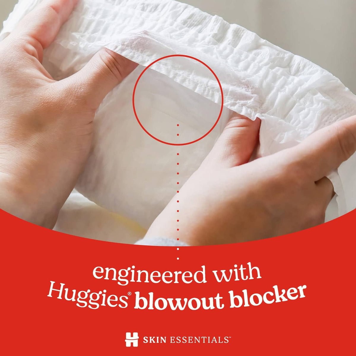 Hands holding white diaper; engineered with Huggies blowout blocker feature