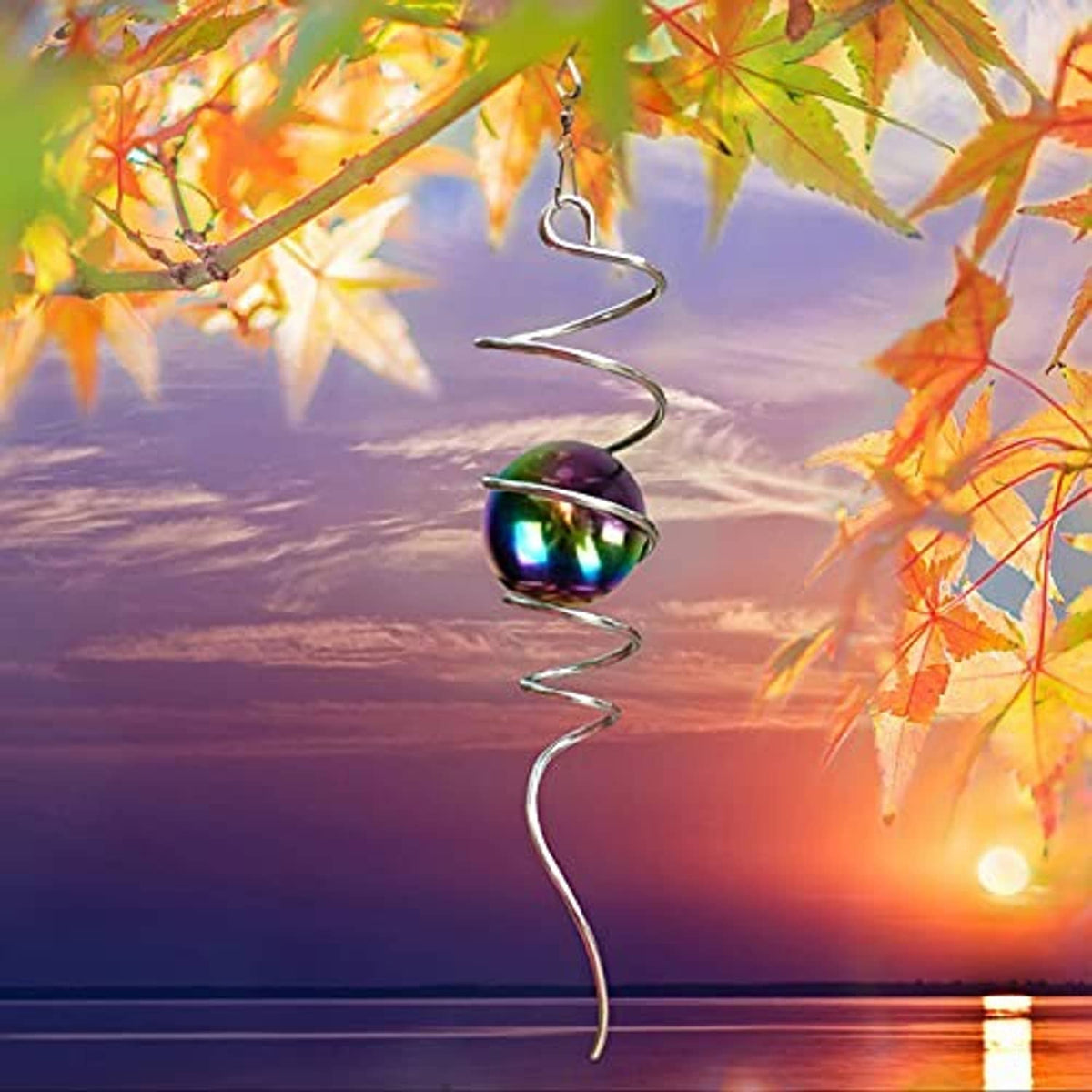 Hanging spiral wind spinner with iridescent multicolor gazing ball and twisted metal helix