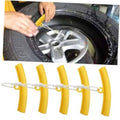 Yellow tire rim protector edge savers set with cord, being placed on a wheel