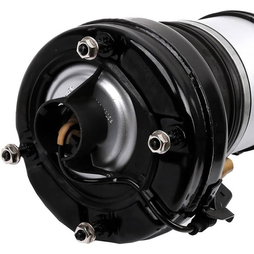 Air suspension strut top cap with bolt holes and black housing, showing inner metal spring
