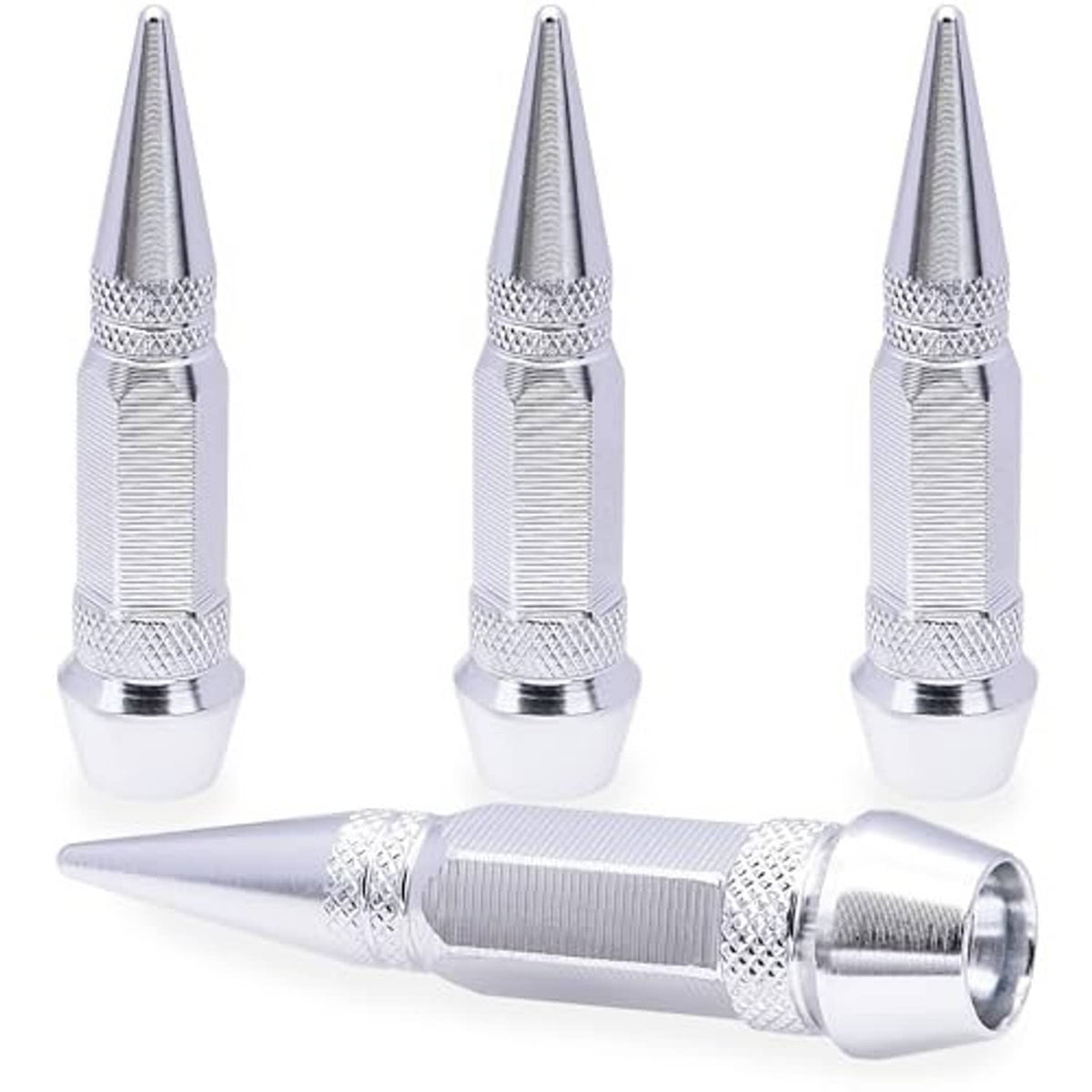 Four spiked aluminum tire valve stem caps, silver, three upright with one foreground