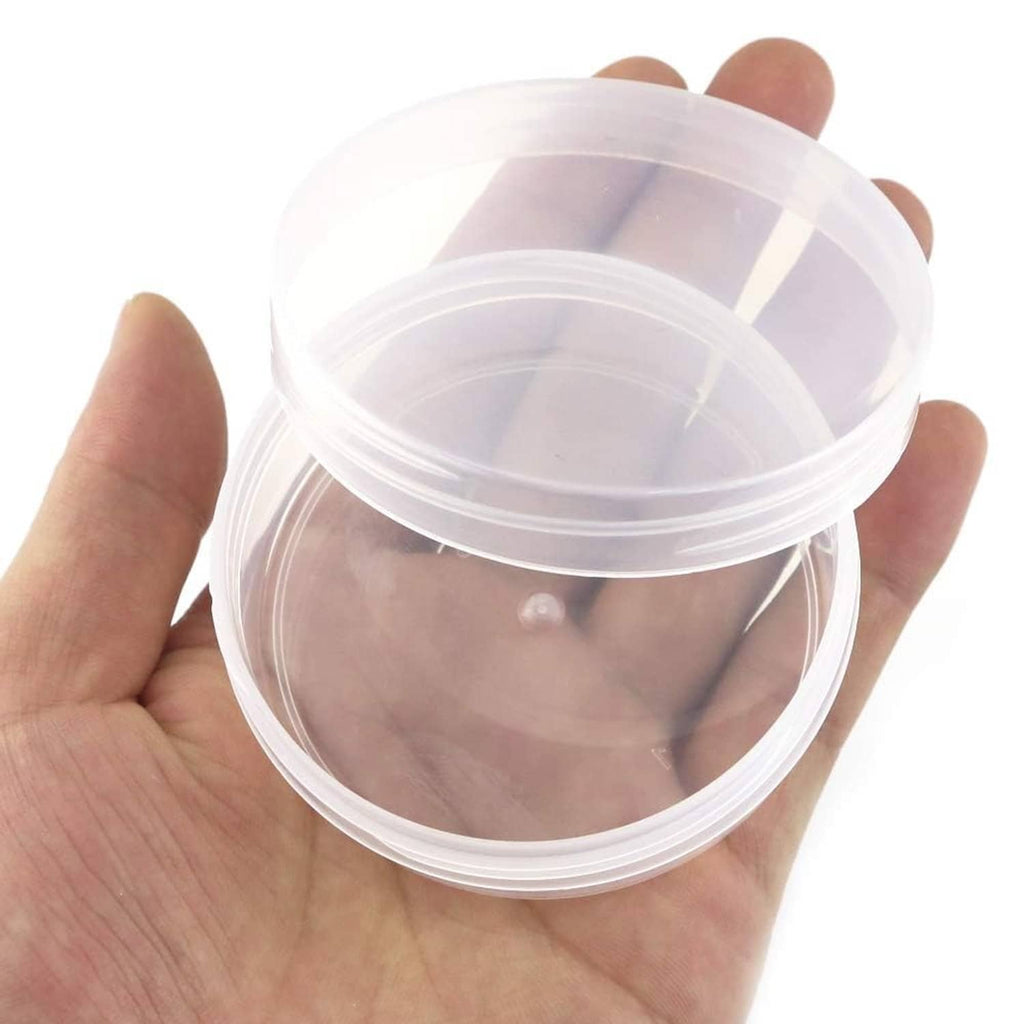 Round clear frosted plastic jar container held in hand, open lid