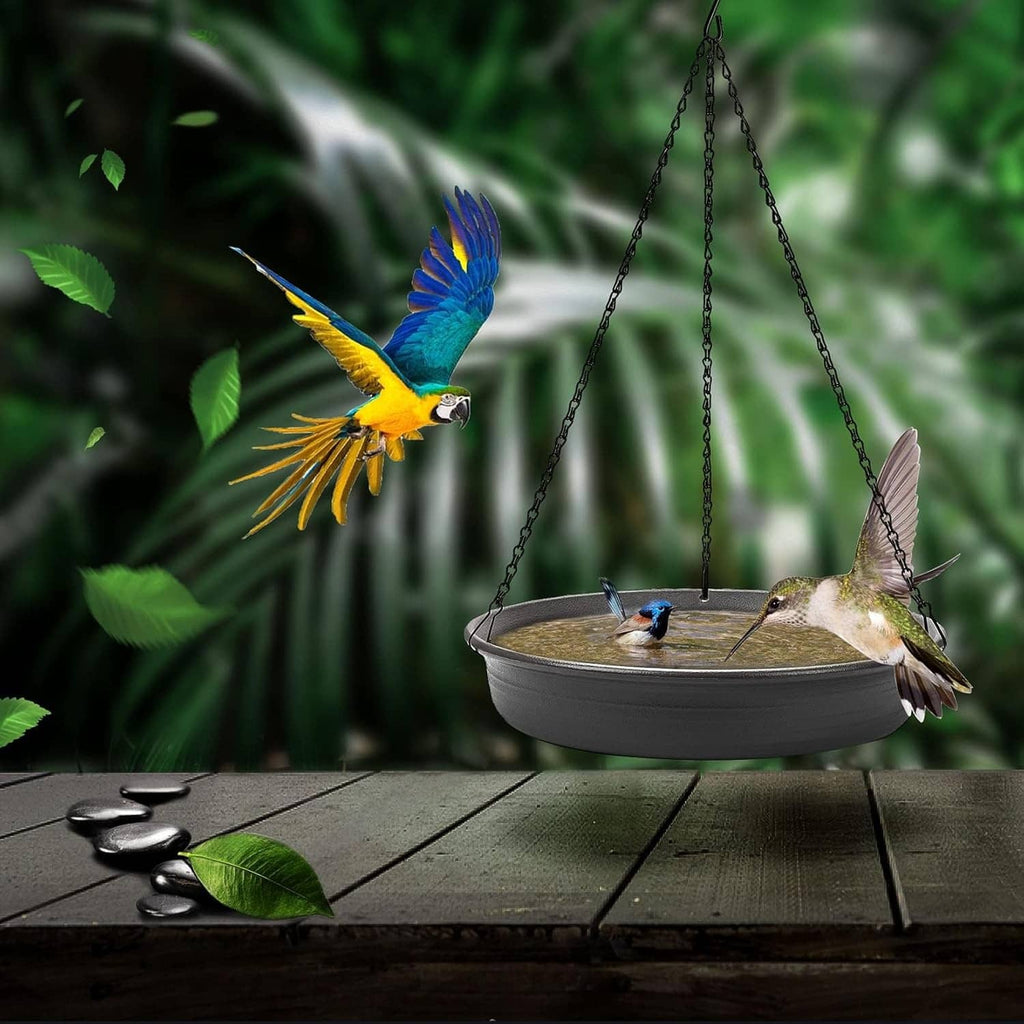 Dark grey hanging bird bath feeder tray with birds at the bowl, suspended
