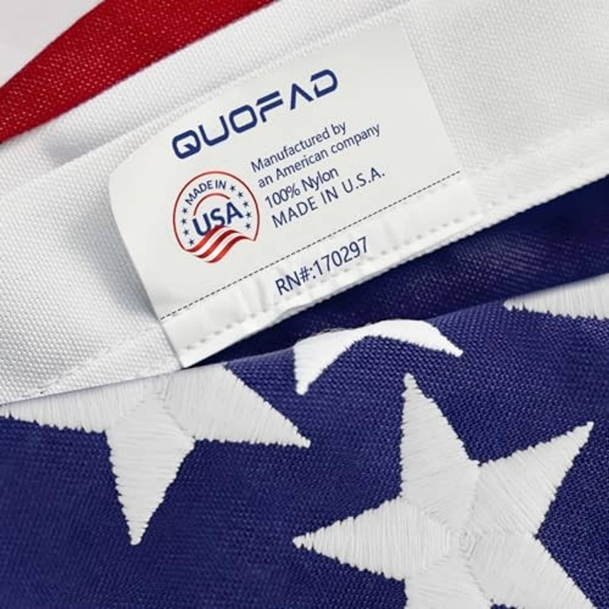 American nylon outdoor flag close-up, white stars on blue field with red stripes