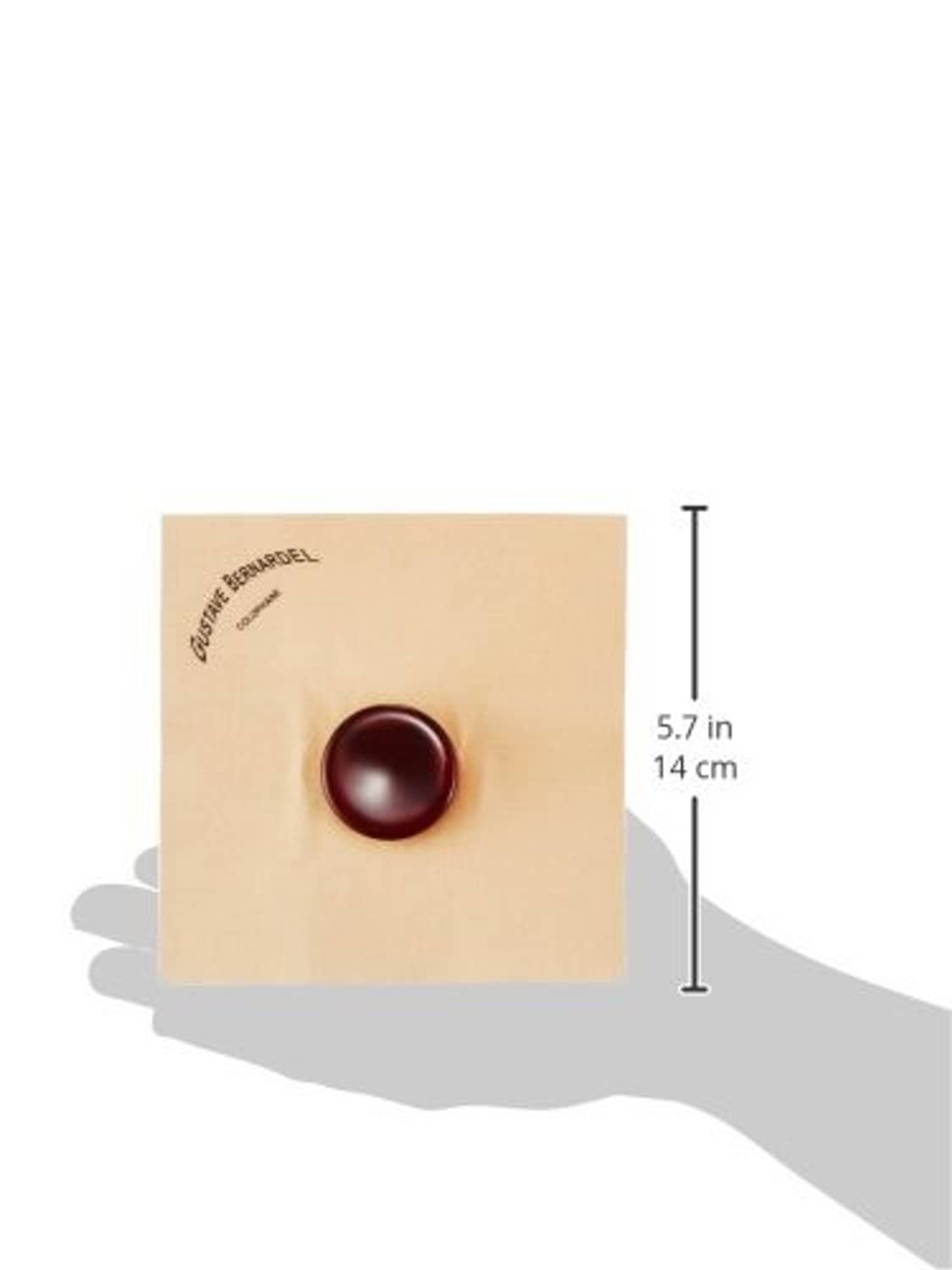 Violin and viola rosin cake, dark amber disc; measures 5.7 in (14 cm)
