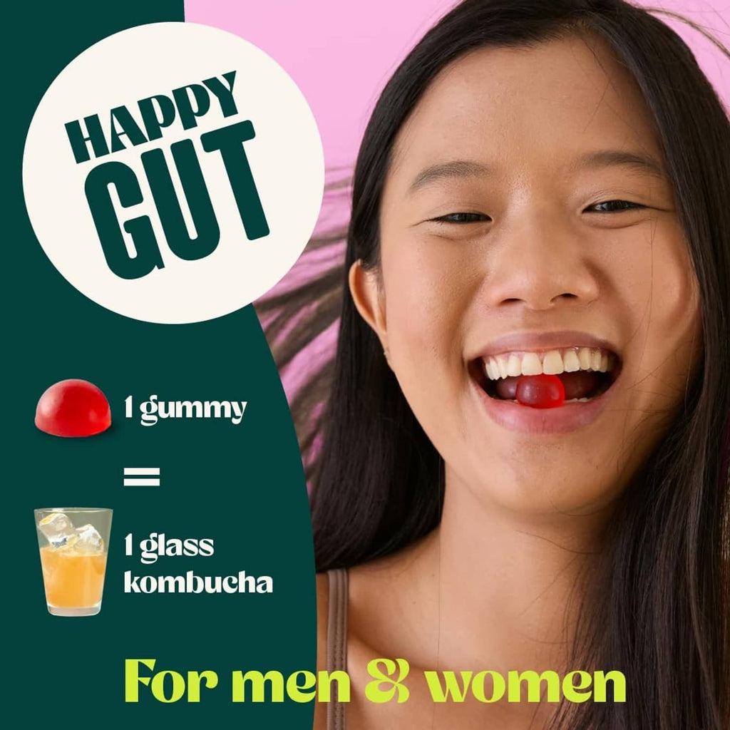 Probiotic kombucha gummy for kids: smiling child with a red gummy in mouth