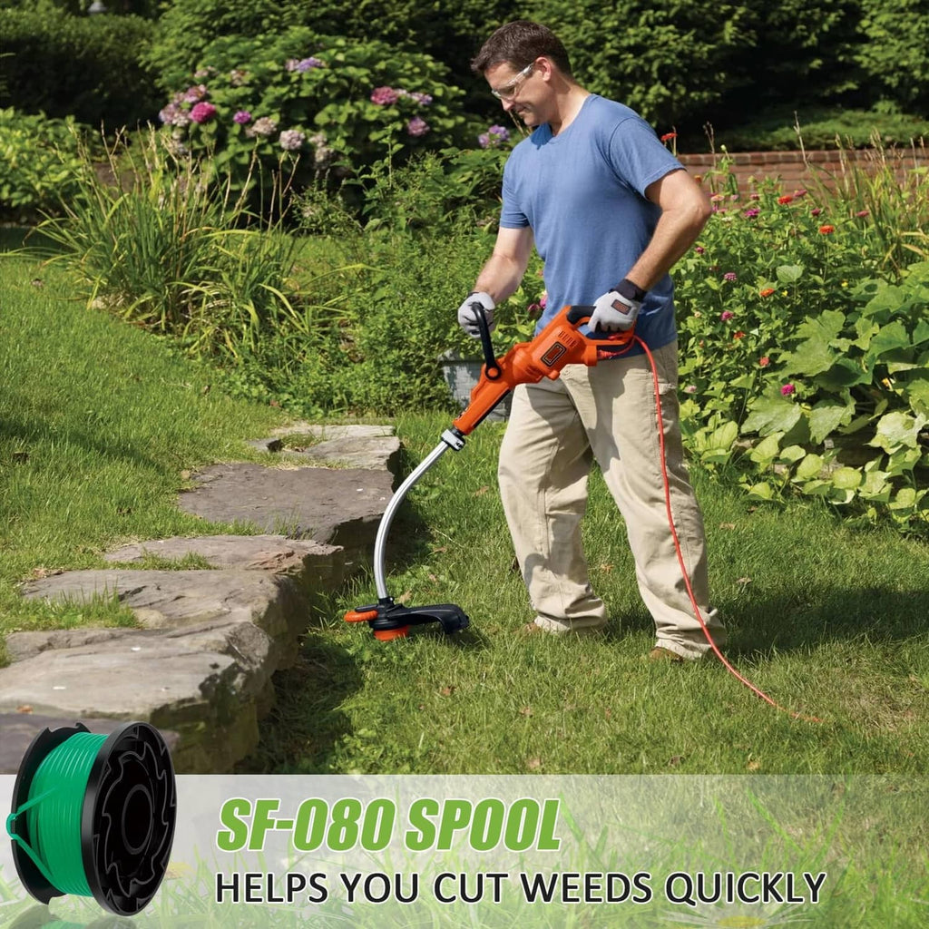 Green trimmer line spool line on trimmer while cutting yard weeds