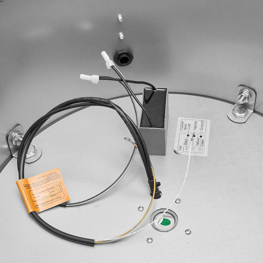 Exhaust fan wiring and terminals on metal control plate with attached cables.