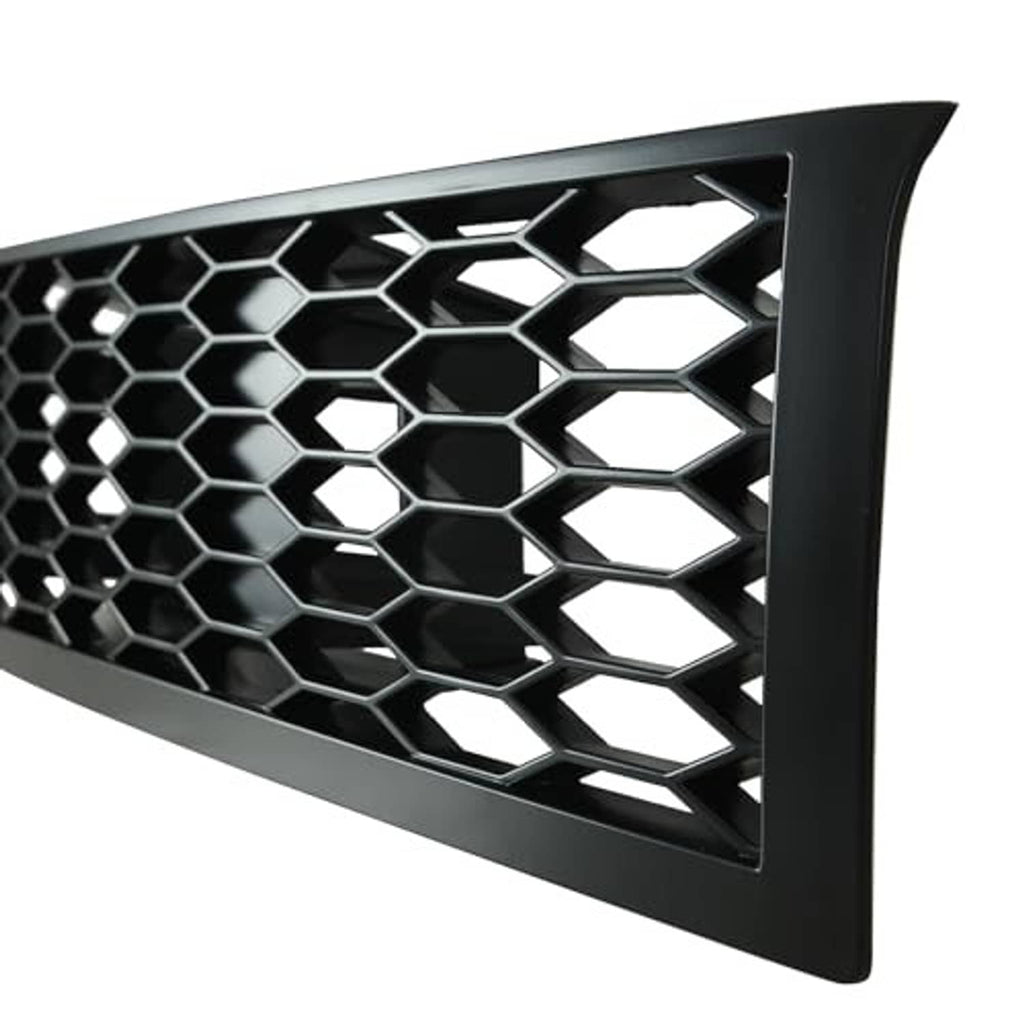 Close-up of hex honeycomb mesh grille with black frame and silver-edged openings