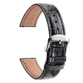 Black leather T-strap watch band with silver buckle clasp and adjustment holes