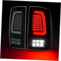 Rear LED tail light assembly with red brake/turn section and clear reverse strip