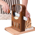 Foldable bread slicing guide in brown with metal cutting blade and handle frame