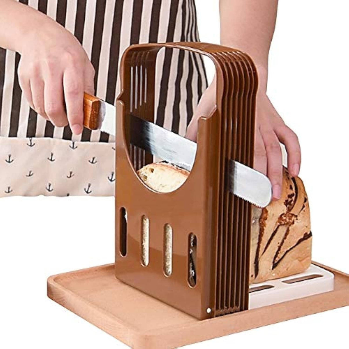 Foldable bread slicing guide in brown with metal cutting blade and handle frame
