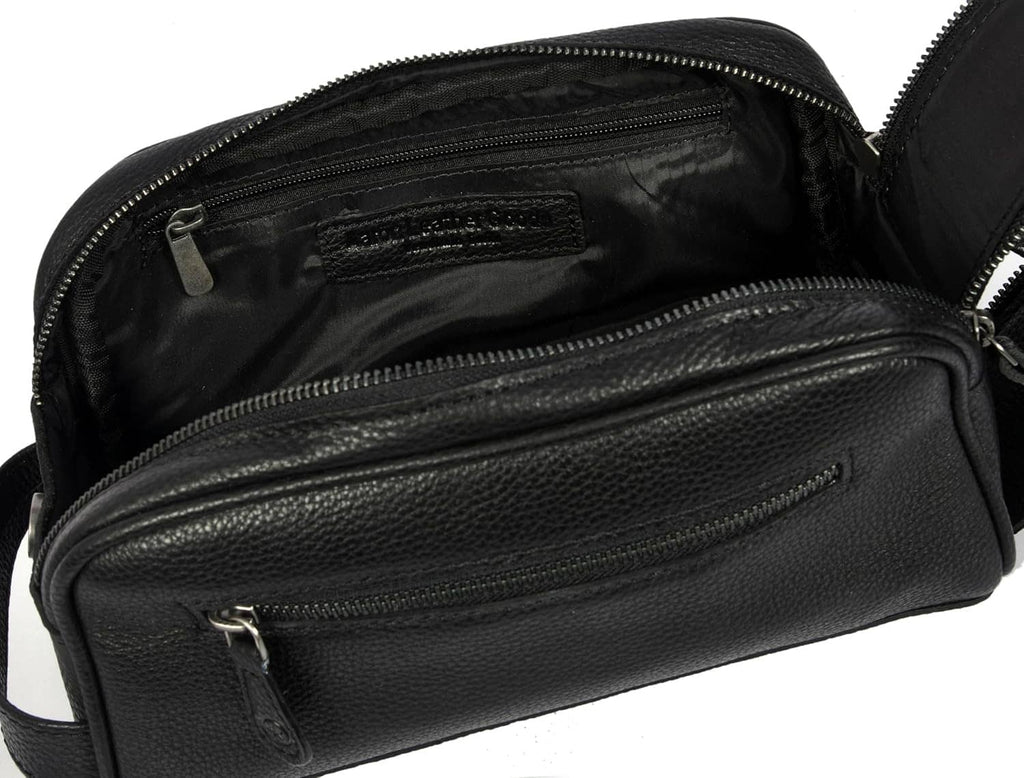 Black leather toiletry pouch interior with front zip compartment and lining