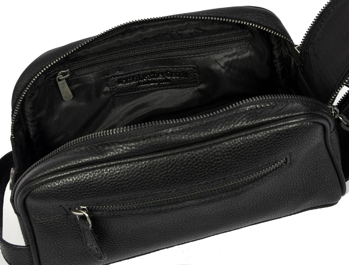 Black leather toiletry pouch interior with front zip compartment and lining