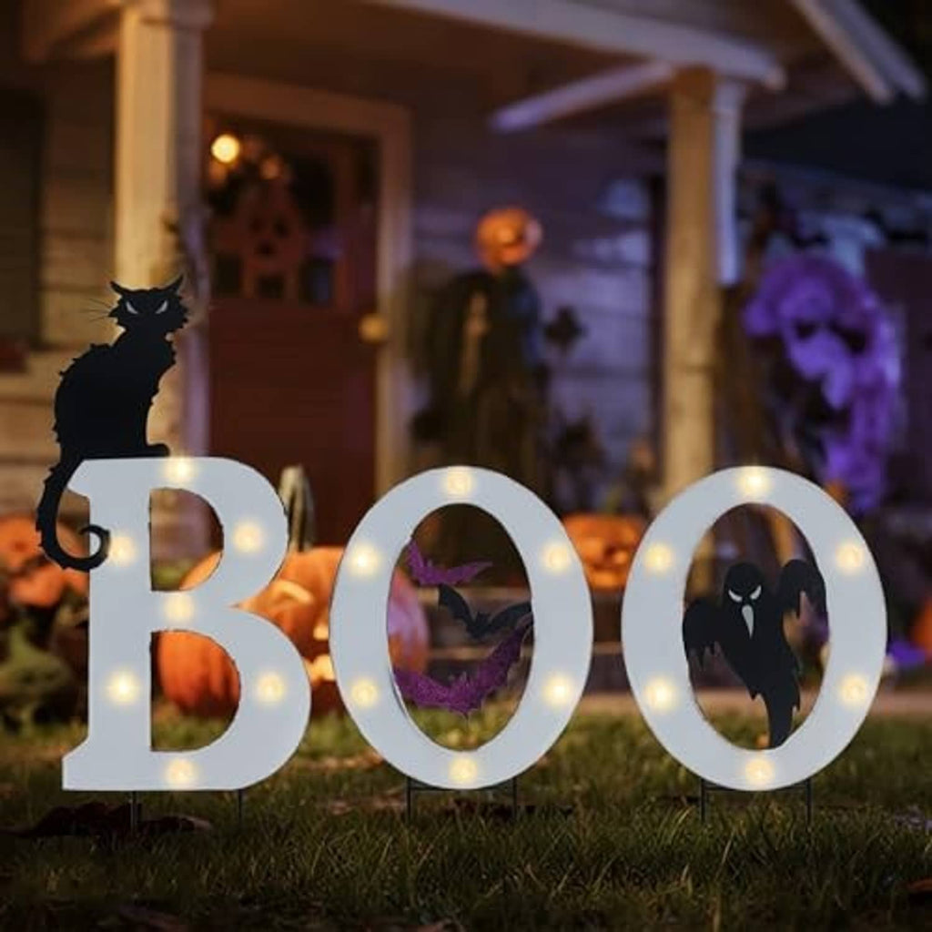 Outdoor BOO solar yard signs with glowing round LED borders and bat, cat, ghost cutouts