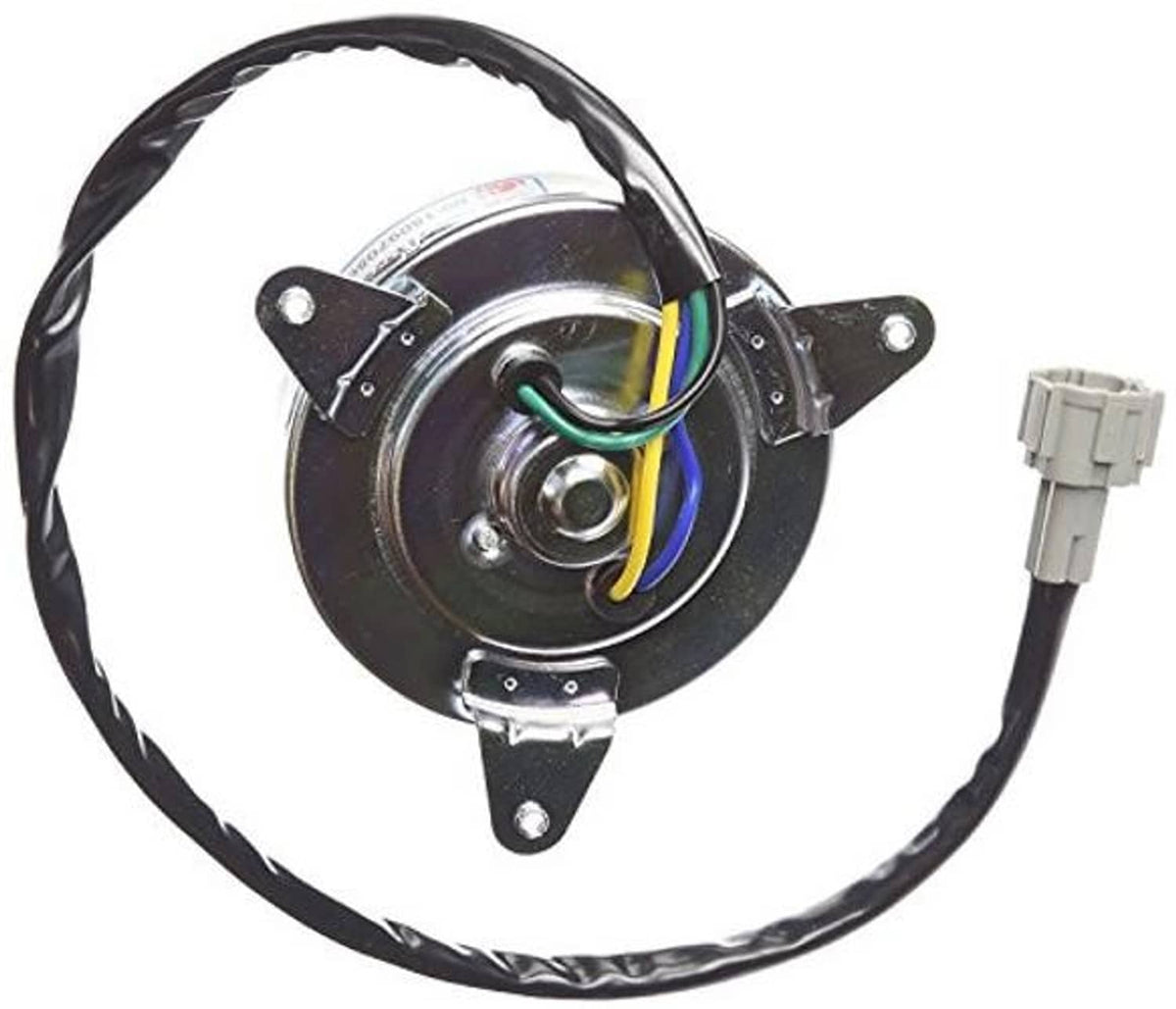 Radiator/condenser cooling fan motor with visible wiring and gray electrical plug connector