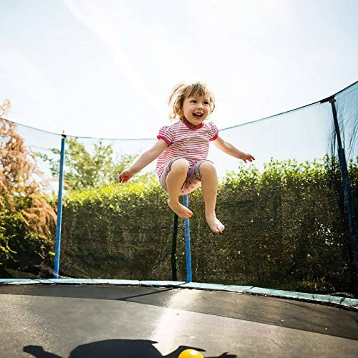 Outdoor trampoline with jumping surface and frame for children
