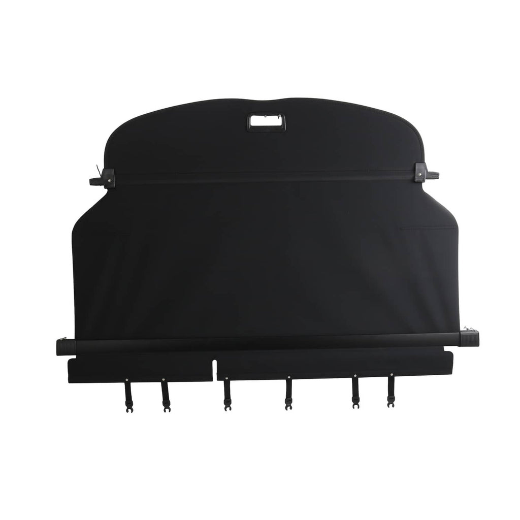 Black rear trunk security cargo cover with central handle and hanging tabs