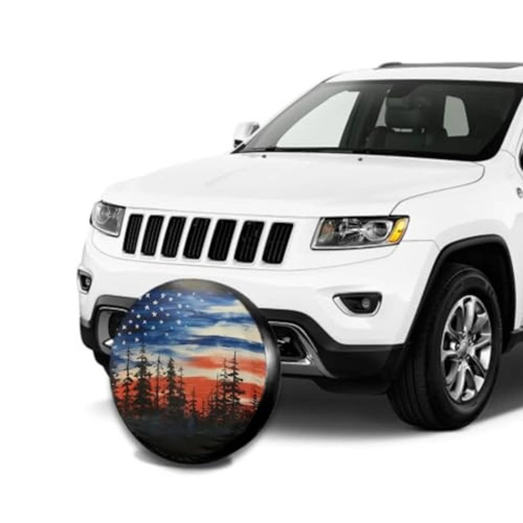 Spare tire cover with American flag forest scene on a front spare tire mount