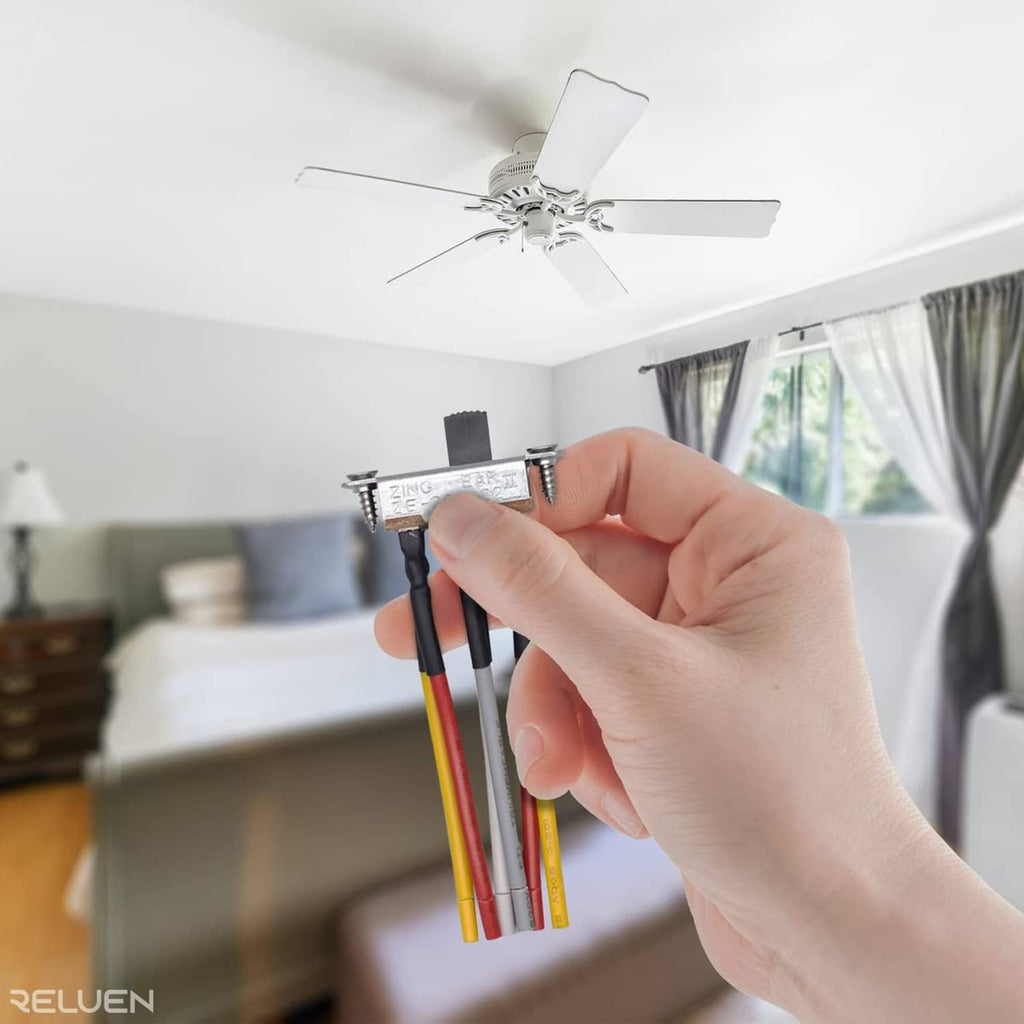 Hand holding ceiling fan reverse slide switch wiring harness with 6-pin connector