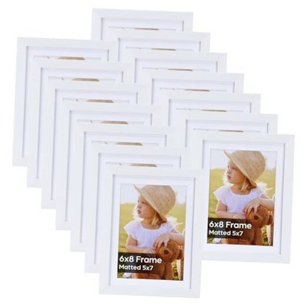 White picture frames set of 15, with inner mat and gold-tone corner hardware visible
