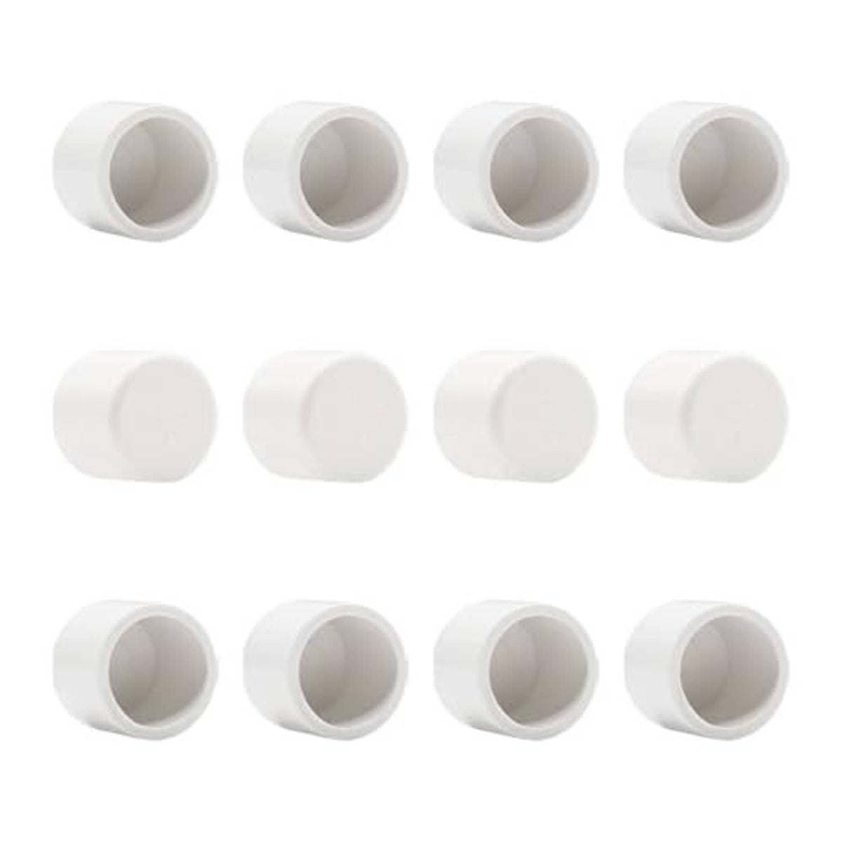 Pack of white PVC pipe end caps with openings visible, arranged in rows