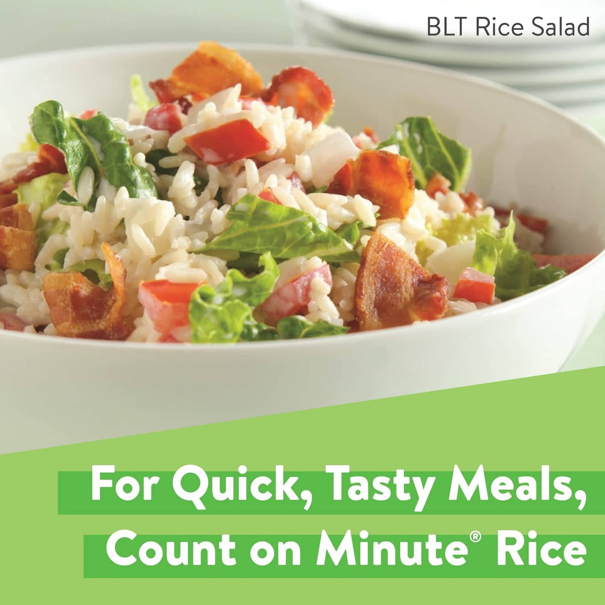 Instant white rice package beside a bowl of rice salad with leafy greens