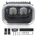 Dual-lens LED driving light with clear front lens and black inner housing, chrome bezel