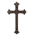 Antique metal Christian wall cross with ornate diamond and heart-shaped detailing