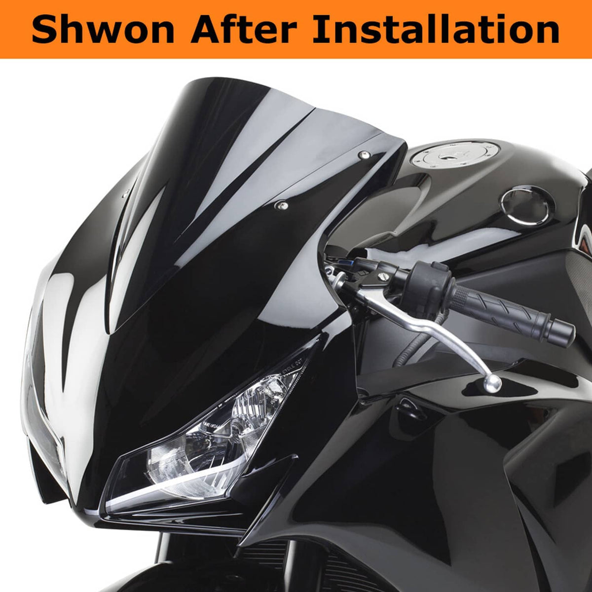 Motorcycle headlight area after installation with black front fairing components